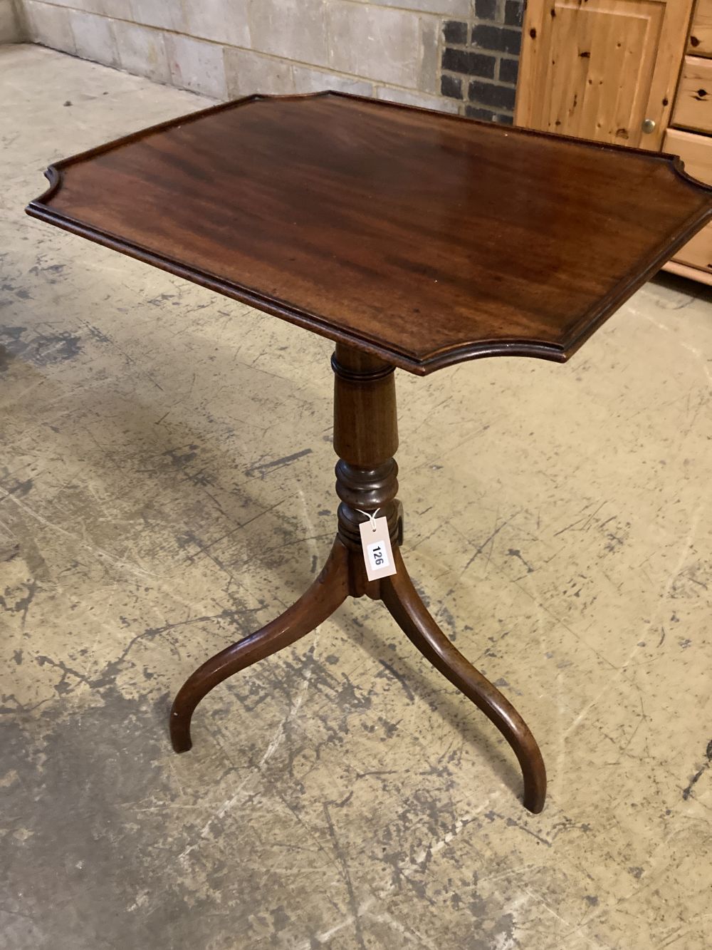 A Regency mahogany tilt top wine table, the rectangular top with re-entrant corners, width 53cm depth 40cm height 73cm